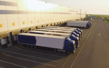 distribution warehouse with trucks awaiting loading.